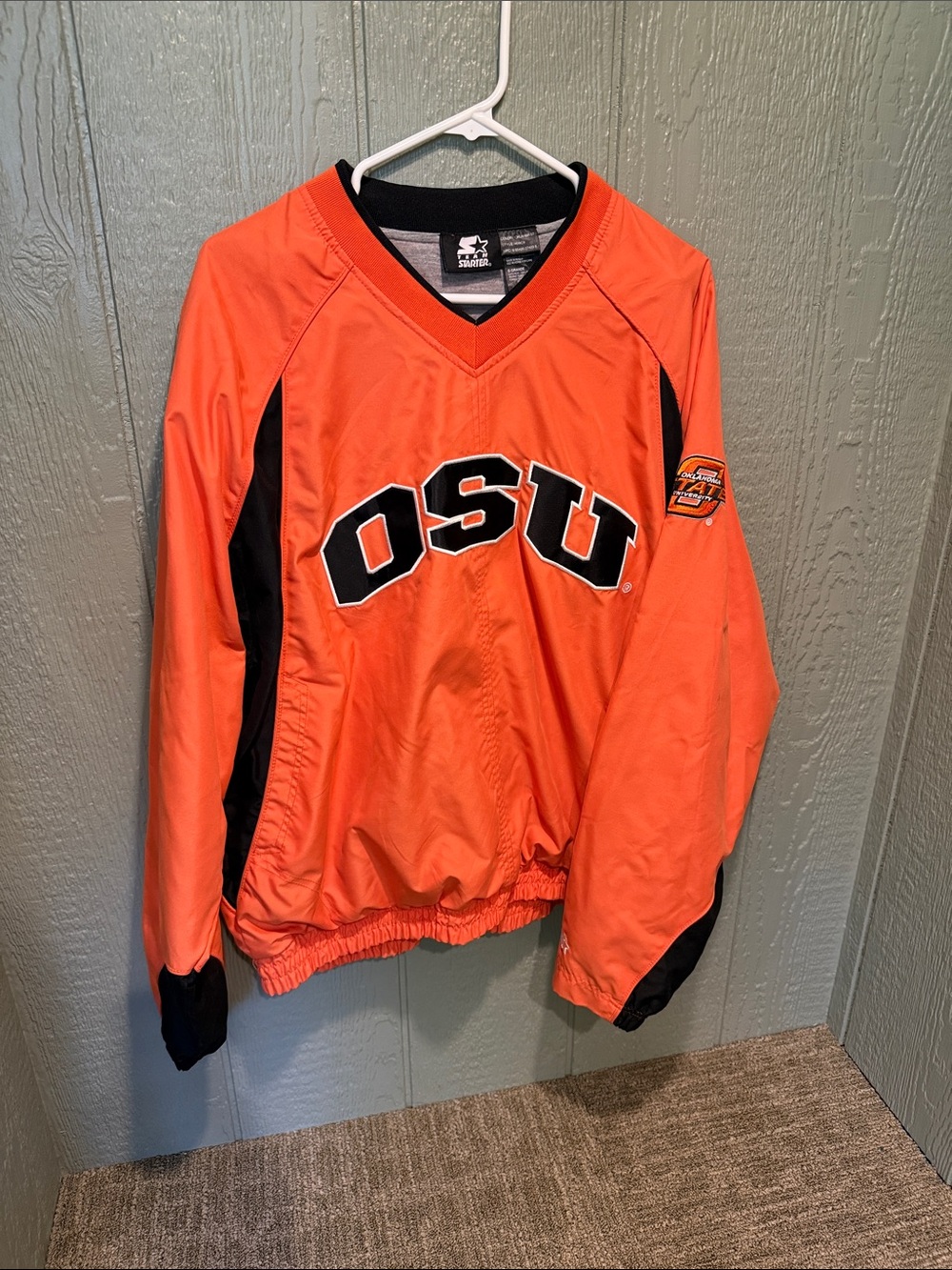 STARTER Oklahoma State University Pullover jacket - large